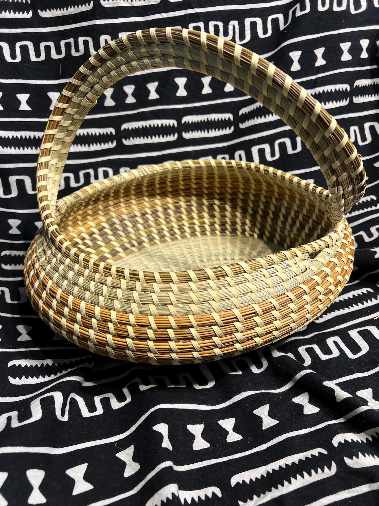 Oval Gullah Bread bowl shaped basket with handle made in Charleston South Carolina Southern Lowcountry Living Essential