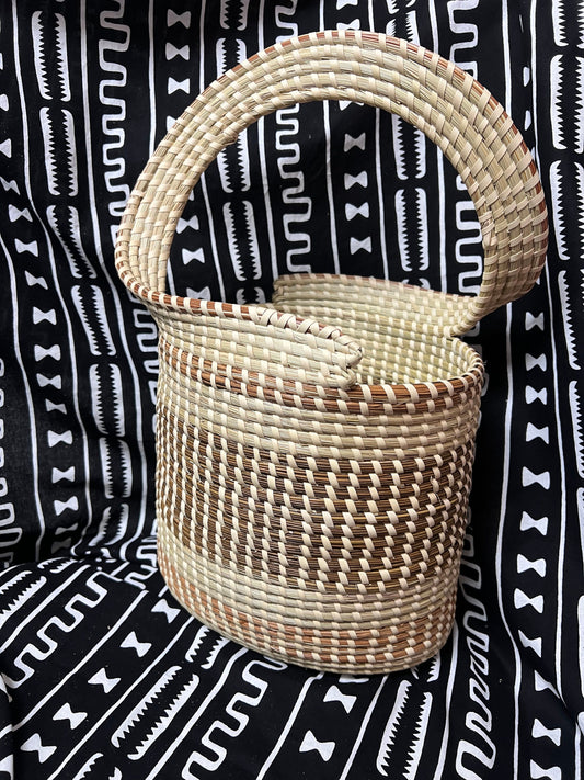 Gullah One of a Kind Twist Handle  Oval Sweetgrass Basket made in charleston South Carolina in Gullah/Geechee sewing style