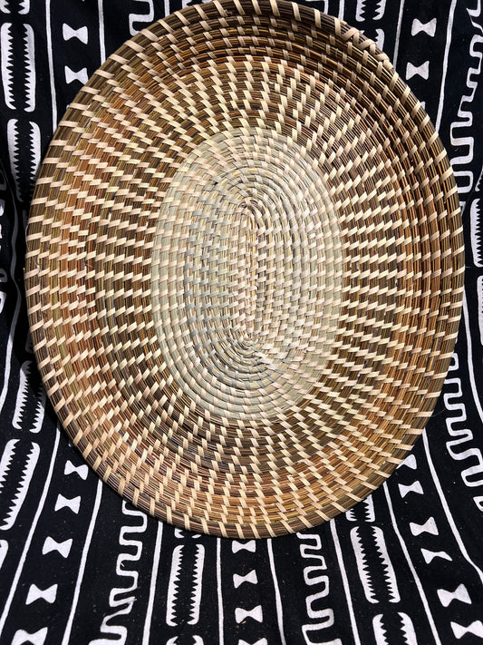 Oval Rice Fanna made in the Lowcountry Charleston South Carolina in the Gullah Geechee tradition.