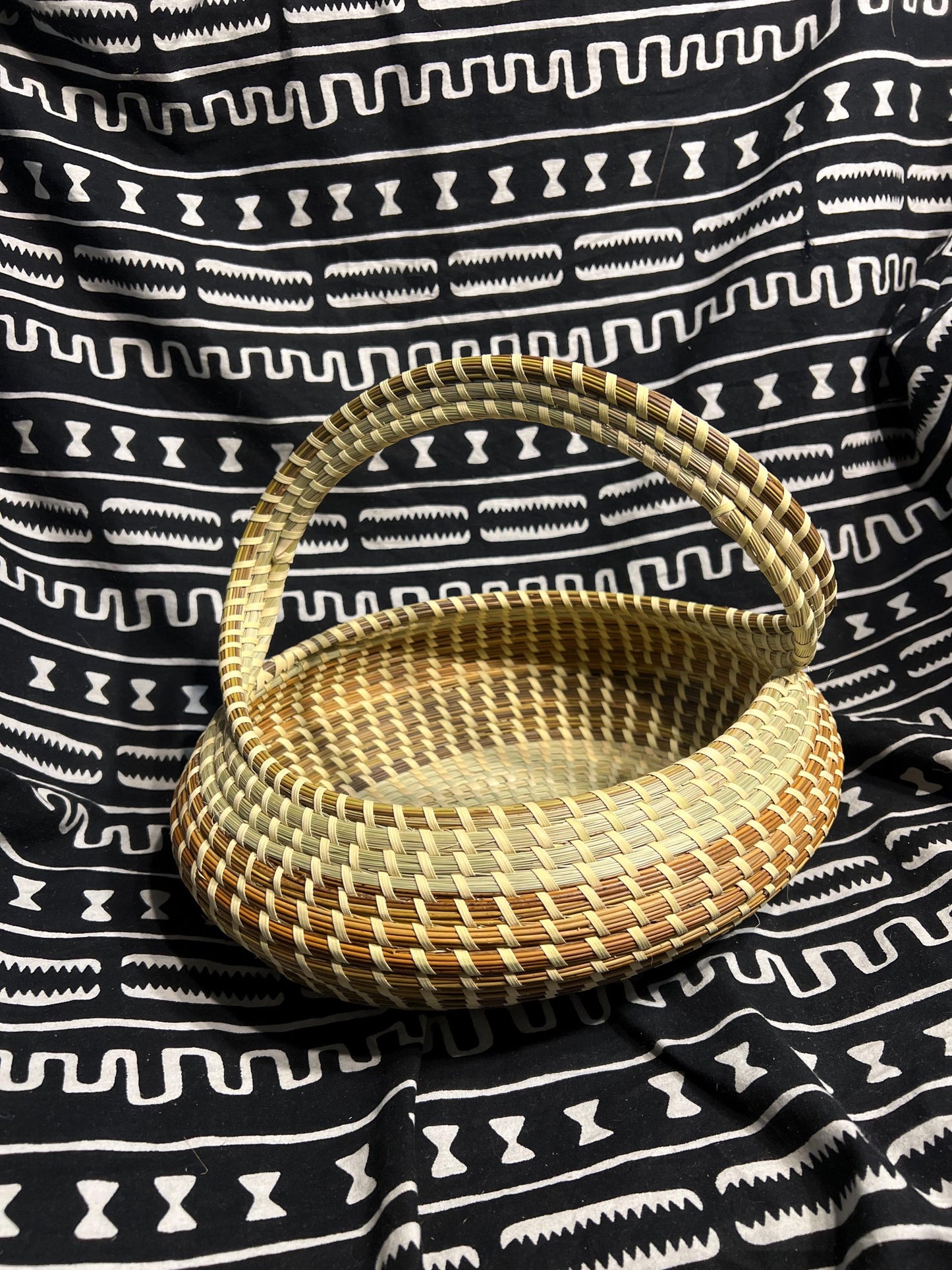 Oval Gullah Bread bowl shaped basket with handle made in Charleston South Carolina Southern Lowcountry Living Essential