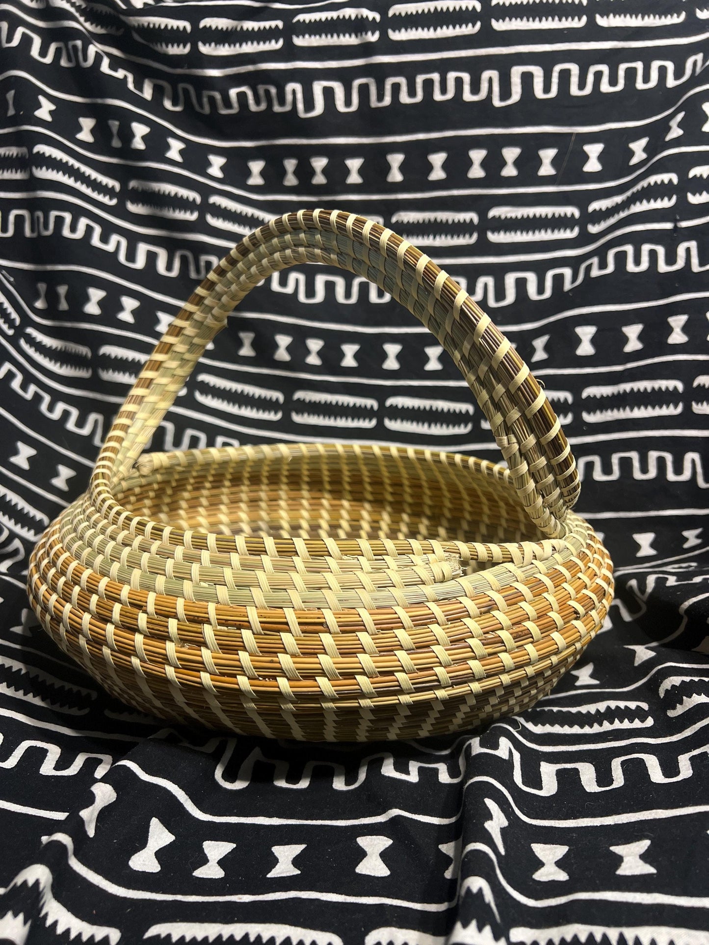 Oval Gullah Bread bowl shaped basket with handle made in Charleston South Carolina Southern Lowcountry Living Essential